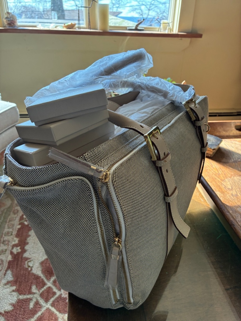 India Hick’s Gray Canvas Travel Tote Bag with Leather Trim and a few tokens